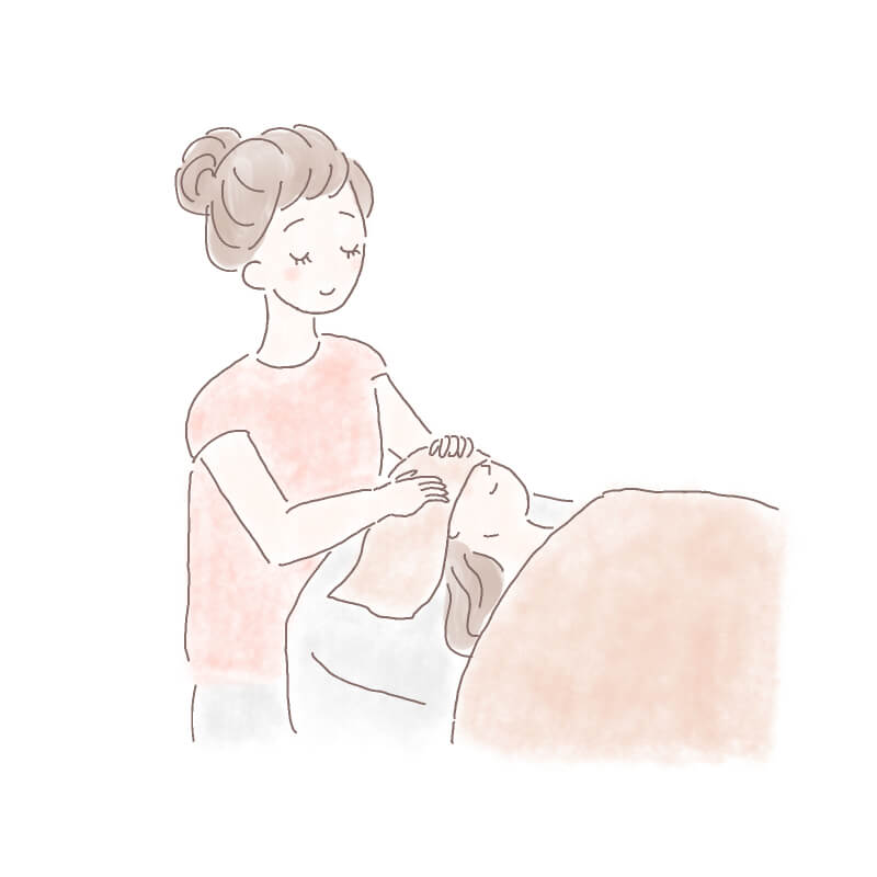 目元にタオルかけられて施術を受けている女性のイラスト